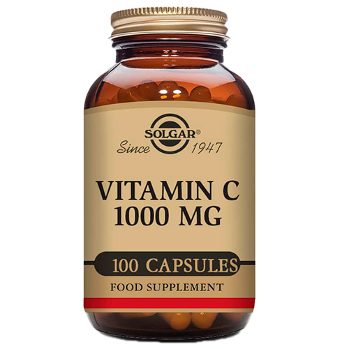 Glas med Solgar Vitamin C 1000 mg kosttilskud i kapselform, 100 kapsler