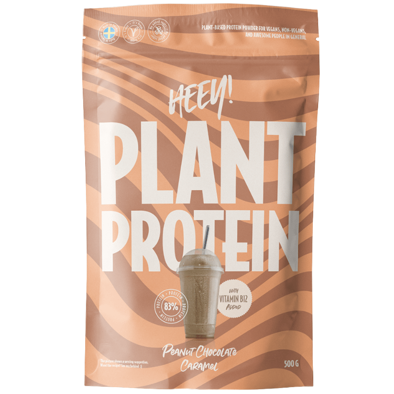 Pose med Heey Vegan Plant Protein + Vitamin B12 i smagen Peanut Chocolate Caramel, 500 g