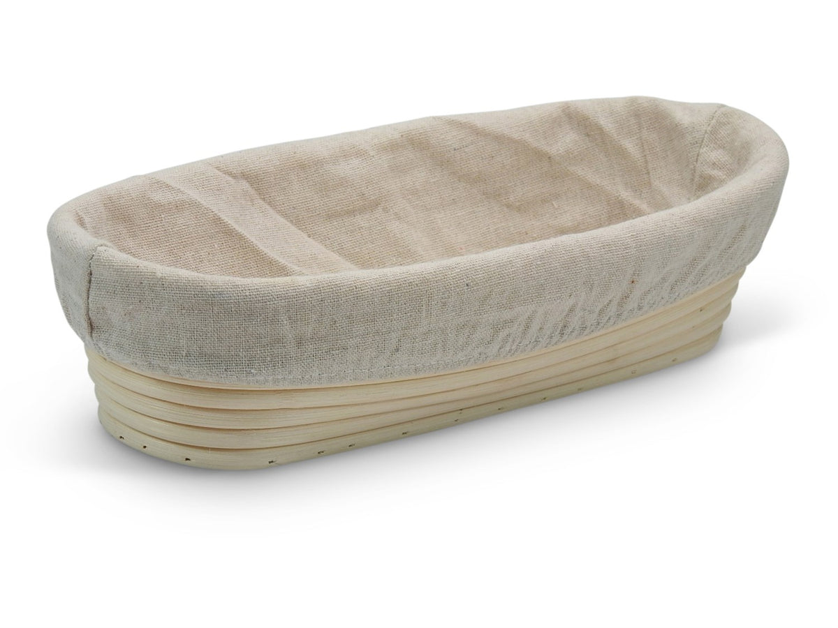 Oval hævekurv i rattan, 25 x 15 cm, med aftageligt klæde til hævning af brød