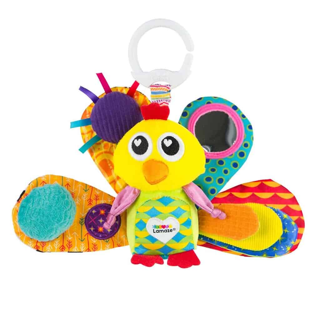 Lamaze Påfuglen Jacque, rangle til baby med bideringe og knitrestof