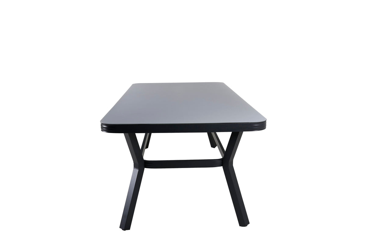 Virya spisebord fra Venture Home i sort med mat glasbordplade og aluminiumsstel