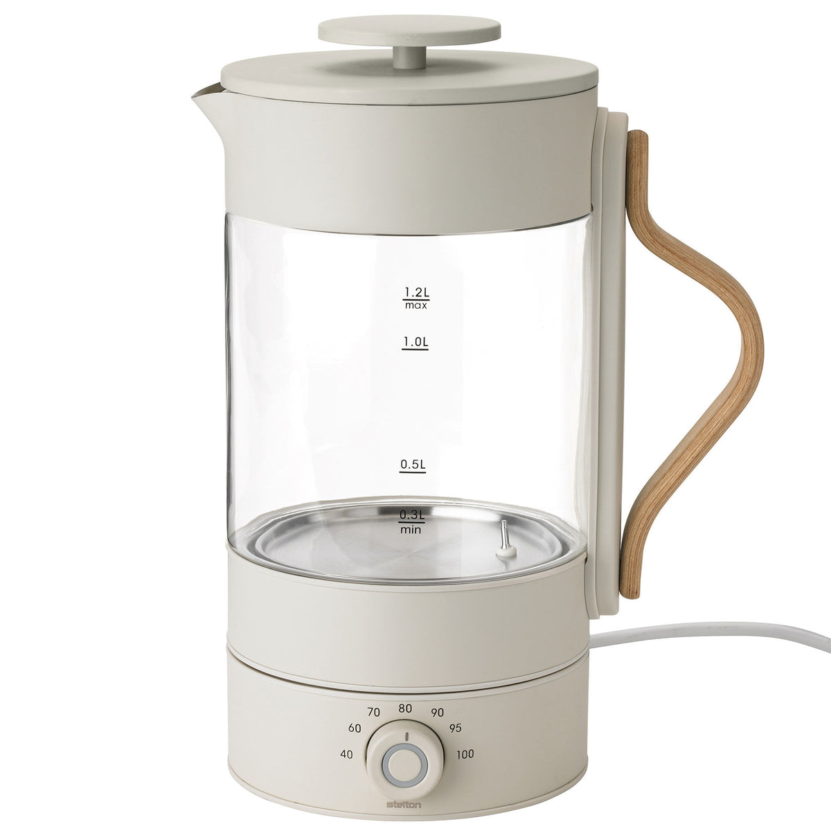 Stelton Emma elkedel i klar/sand med drejeknap på basen, 1,2 liter