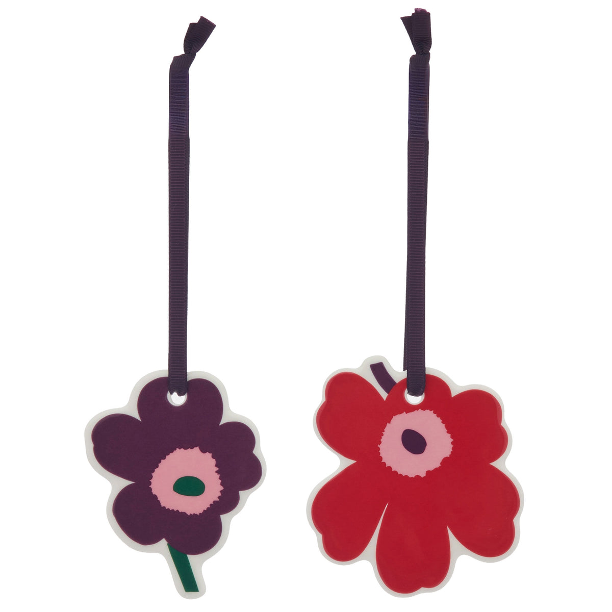 To flade Marimekko Unikko-ornamenter i cranberry og pink i gaveæske