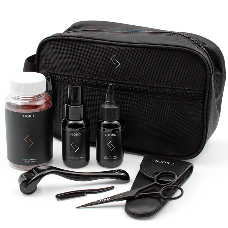Njord Beard Growth Kit plejesæt til mænd med skægserum, beard roller, kam, saks og spray