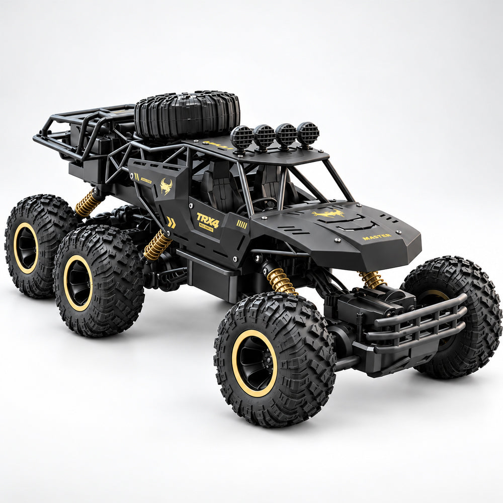 Sort fjernstyret offroadbil med seks store hjul og markant affjedring