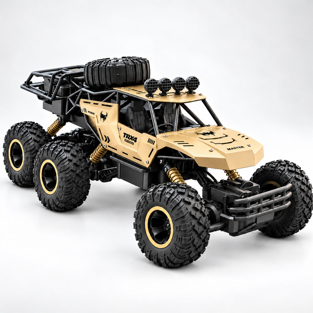 Guldfarvet fjernstyret offroadbil med seks store hjul og markant affjedring