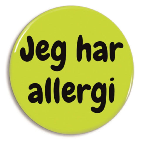 Gul badge med teksten Jeg har allergi til at sætte på tøj eller taske