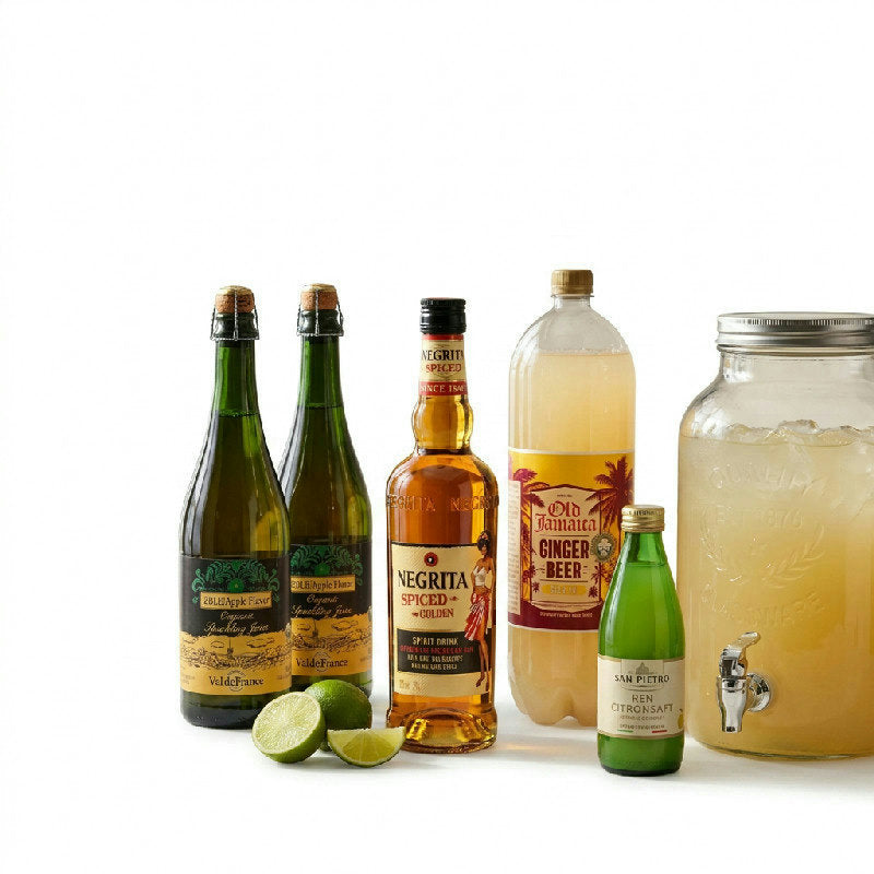 Dark ’n’ Stormy Apple Twist drinkspakke med ingredienser og drikkevaredispenser i glas