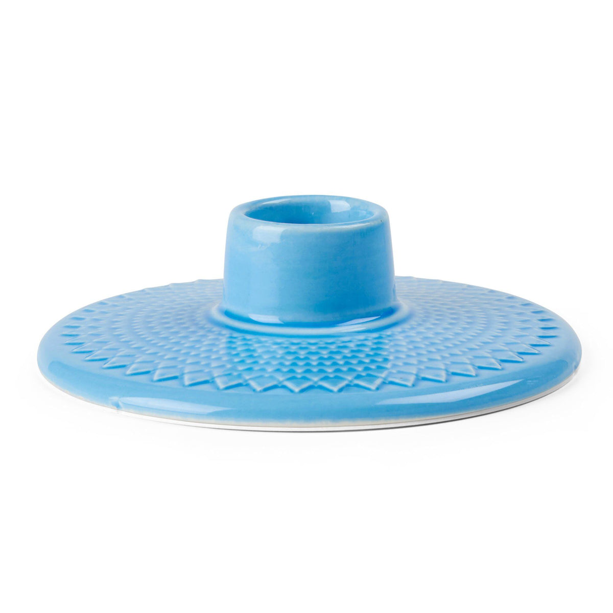 Blå lysestage fra Lyngby Porcelæns serie Rhombe Color, lavet som supplement til seriens fade