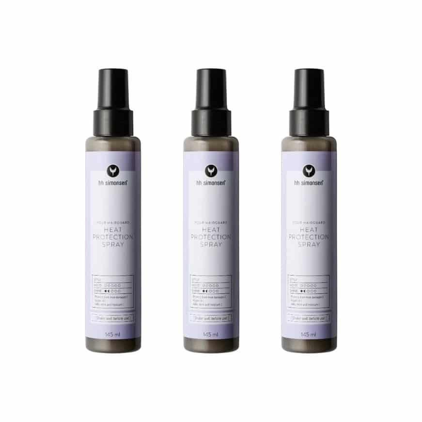 Tre flasker HH Simonsen Heat Protection Spray à 145 ml til brug med stylingredskaber