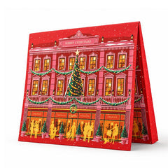 Rød julekalender i husform med håndlavede chokolader fra Sv. Michelsen