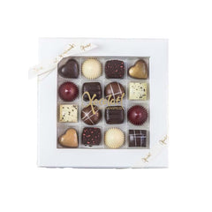 Hvid julegaveæske fra Xocolatl, Christiansfelder Star, med bånd med stjerner