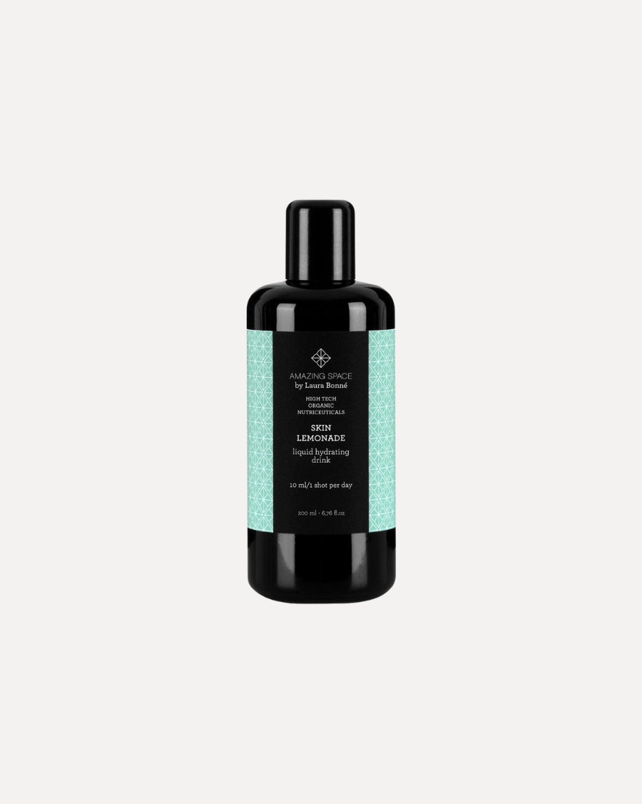 Flaske med Skin Lemonade, økologisk grøn drik fra Amazing Space