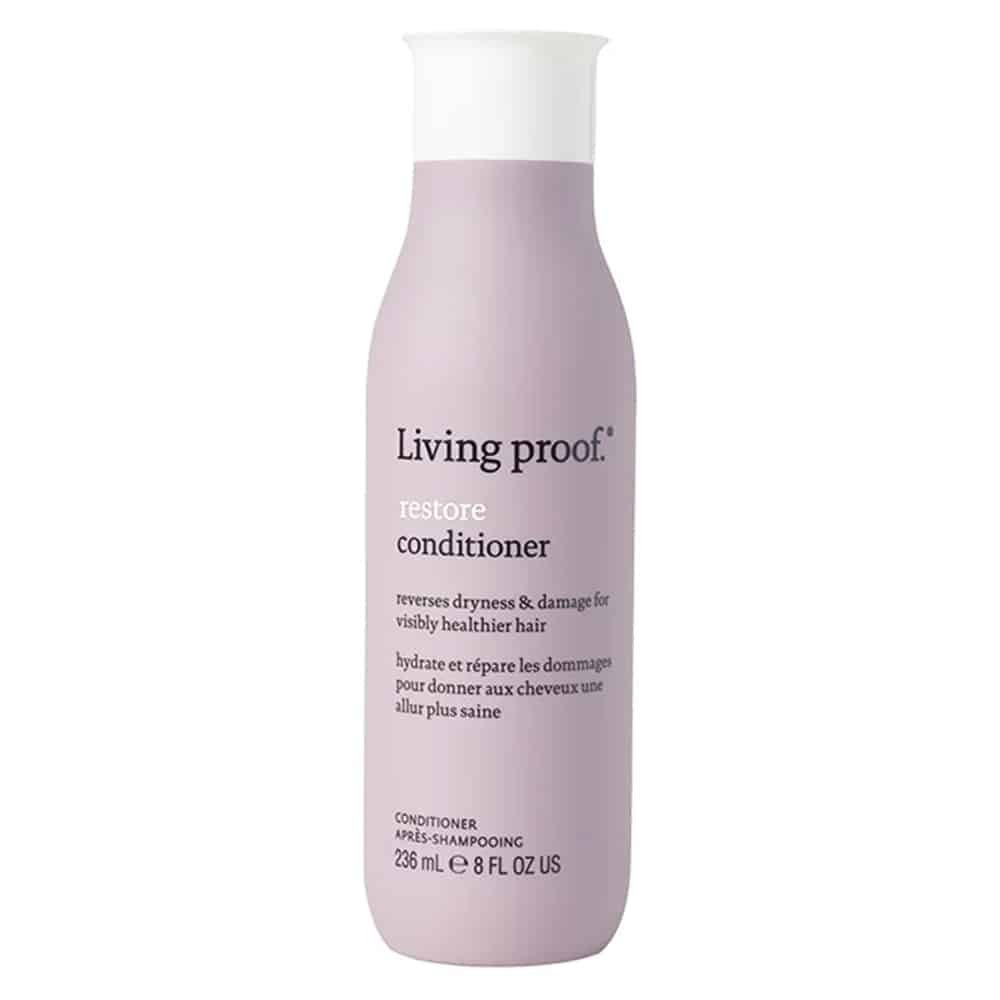 Flaske med Living Proof Restore Conditioner, 236 ml balsam til tørt og skadet hår
