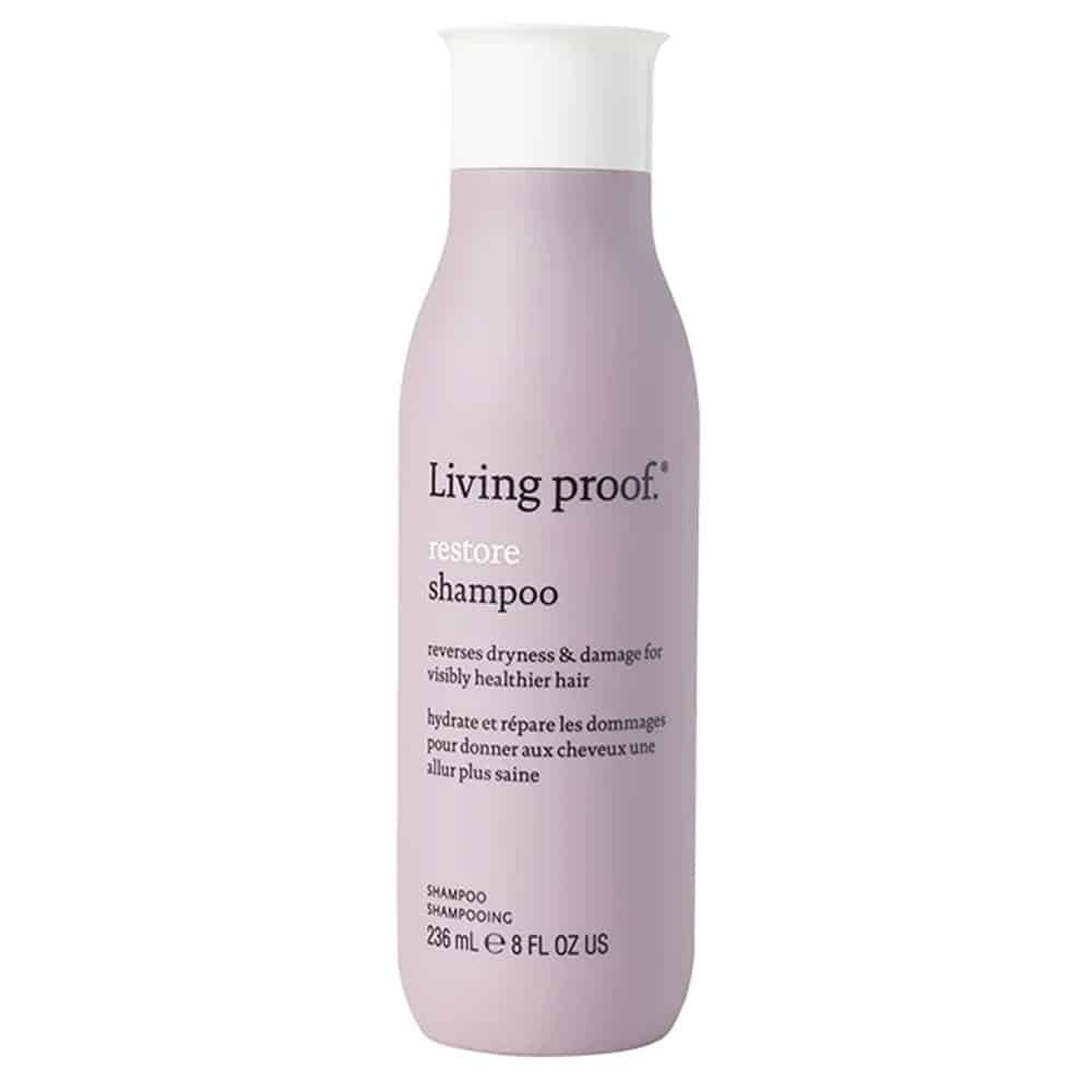 Flaske med Living Proof Restore shampoo, 236 ml, til tørt og skadet hår