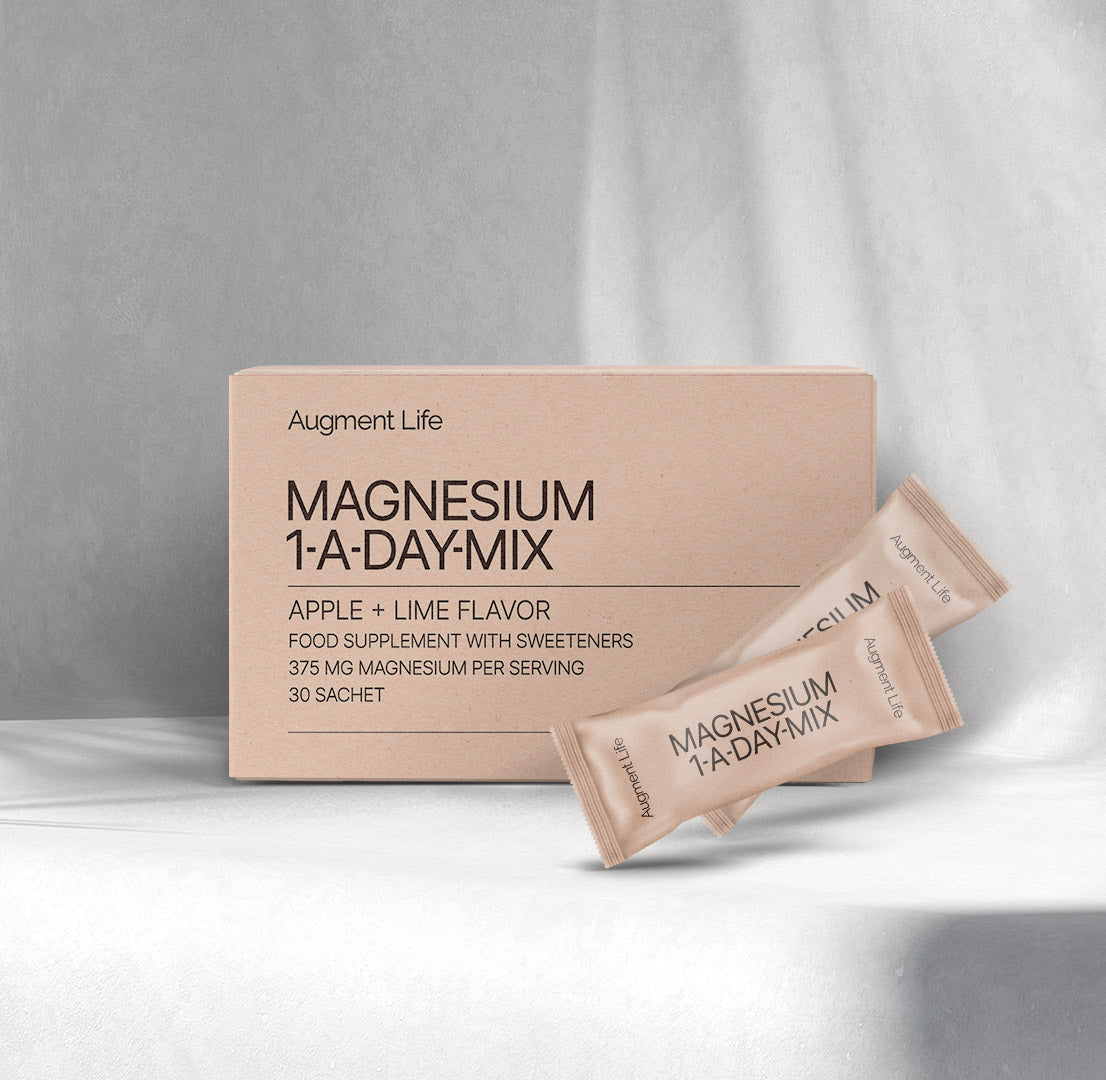 Pakke med Augment Life Magnesium 1-A-Day Mix pulverbreve med æble-lime-smag