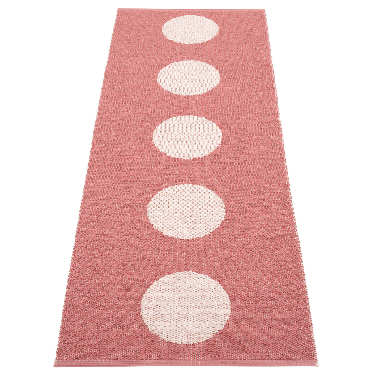 Pappelina Vera Pop tæppe i blush og pink med cirkelmønster, 70 x 200 cm