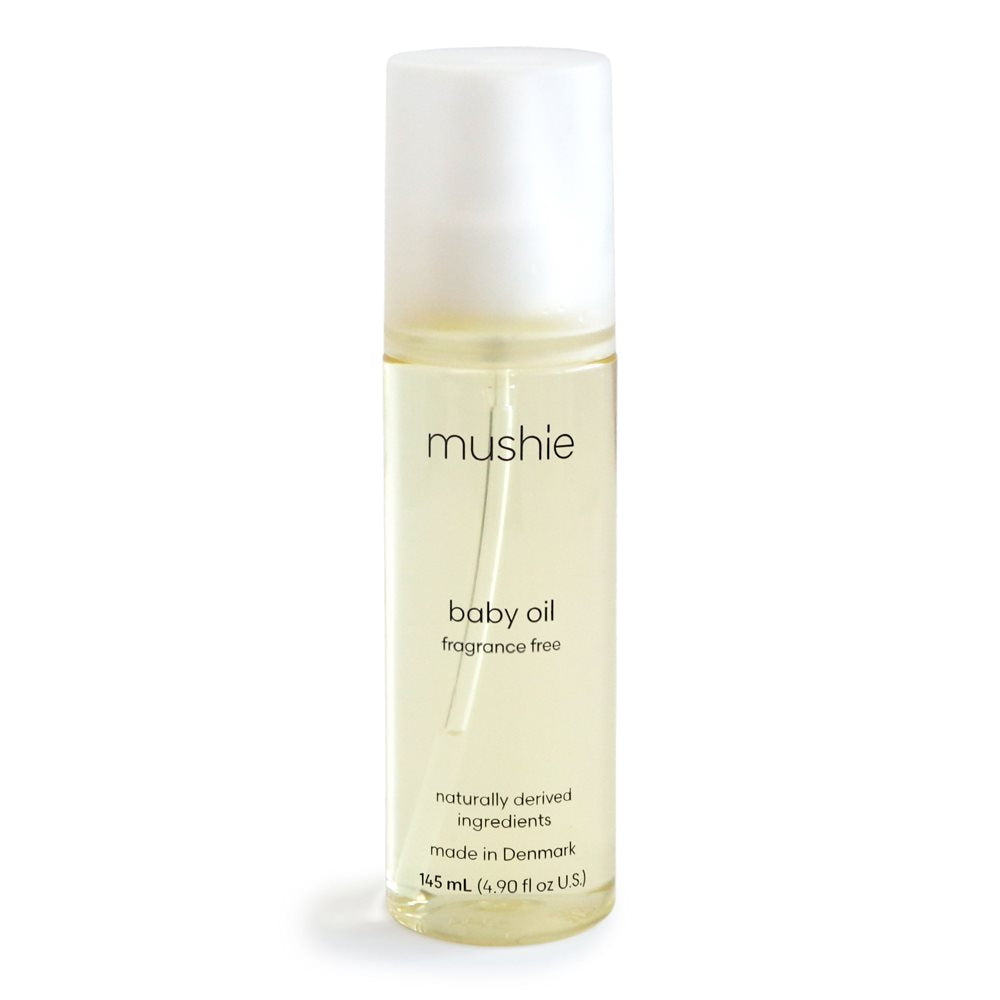Flaske med Mushie Baby Oil, babyolie uden duft og Svanemærket