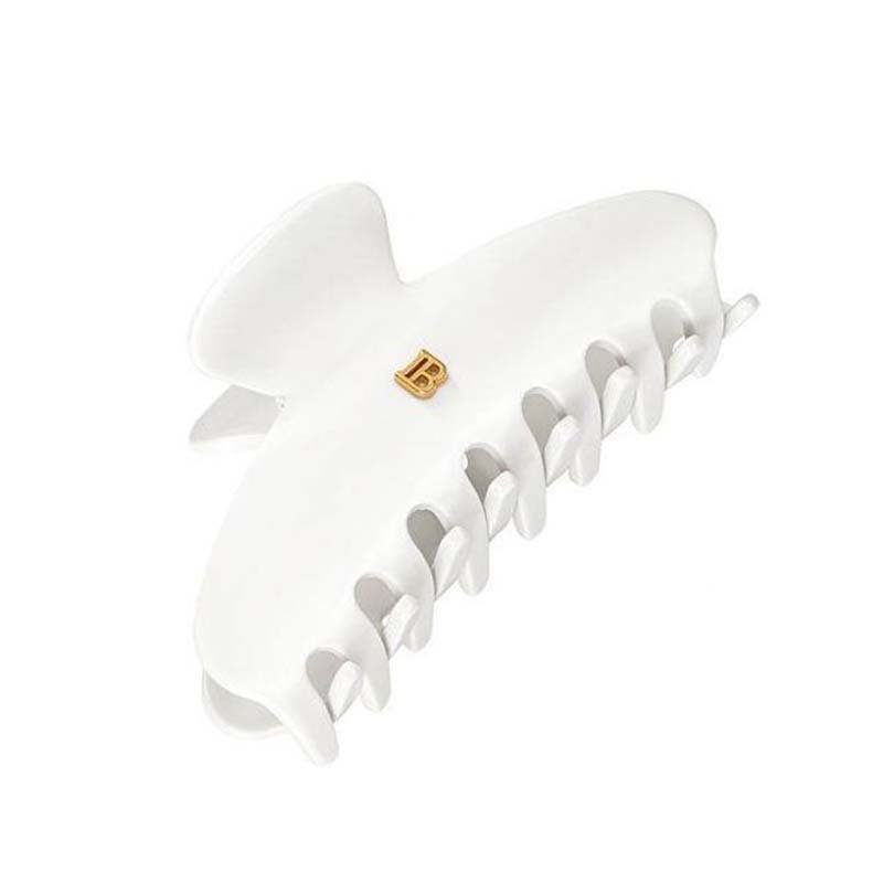 Balmain medium clawclip i ren hvid celluloseacetat med forgyldt B-logo