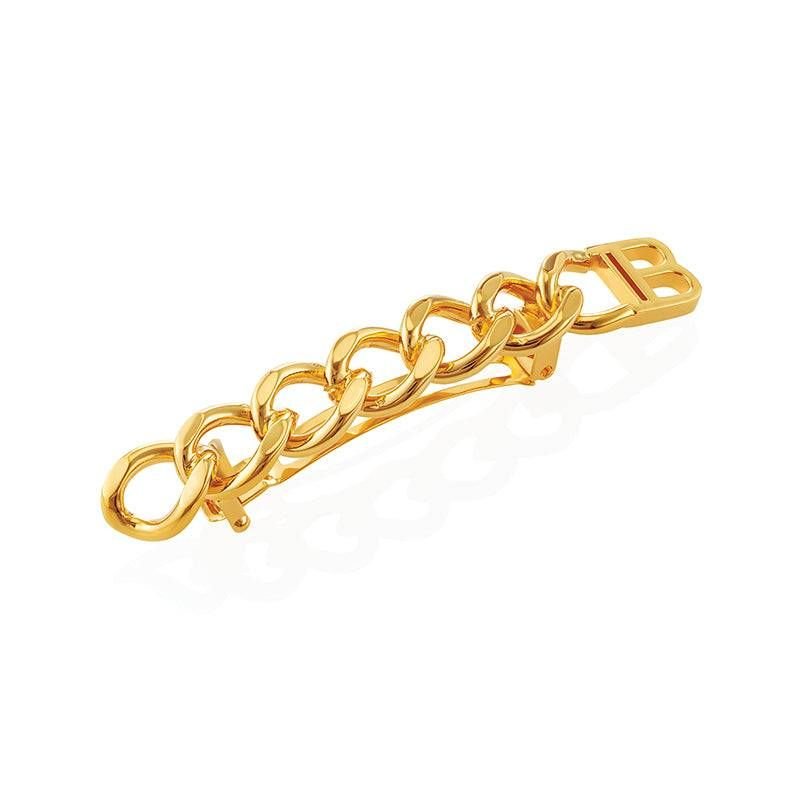 Håndlavet 18K guldbelagt hårspænde med kædedesign og graveret logo fra Balmain Hair Couture