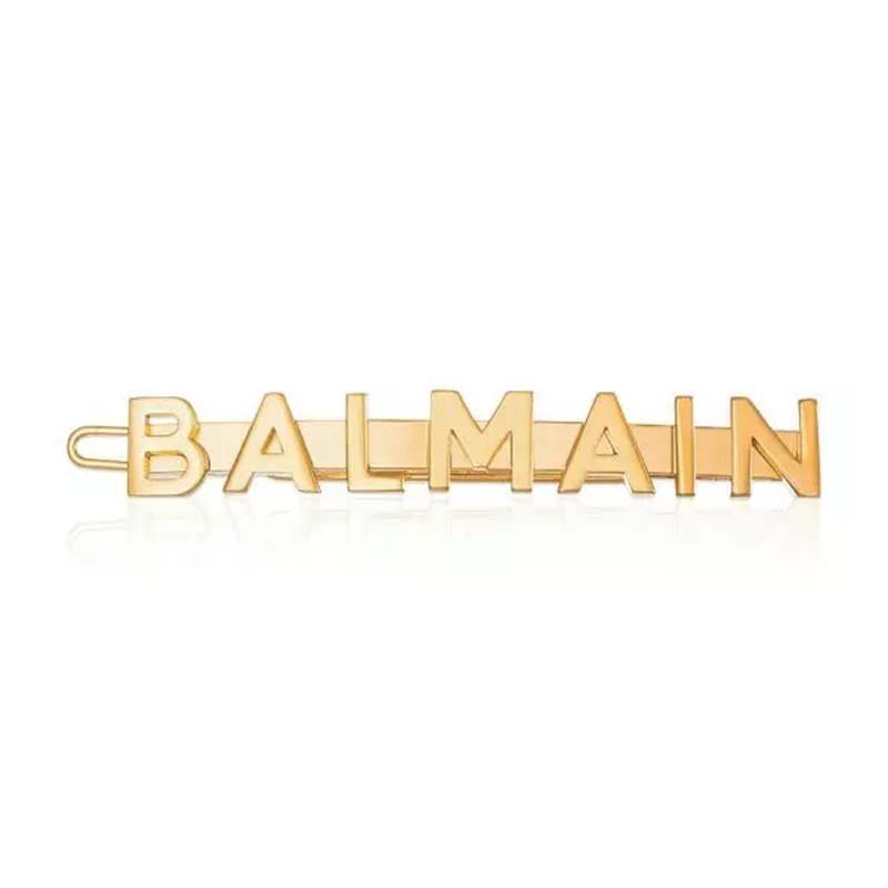 Håndlavet 18K guldbelagt hår-slide med ikonisk Balmain-logo fra Hair Couture