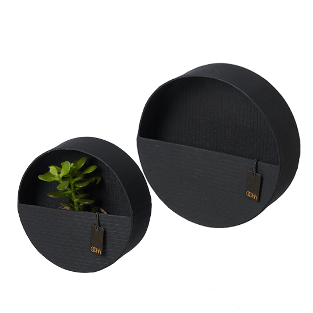 To dekorationshylder i genbrugspapir med sort cementfinish