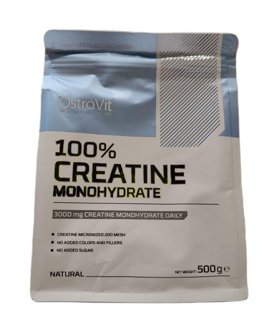 Beholder med OstroVit Creatine Monohydrate natural, 500 g kreatinpulver