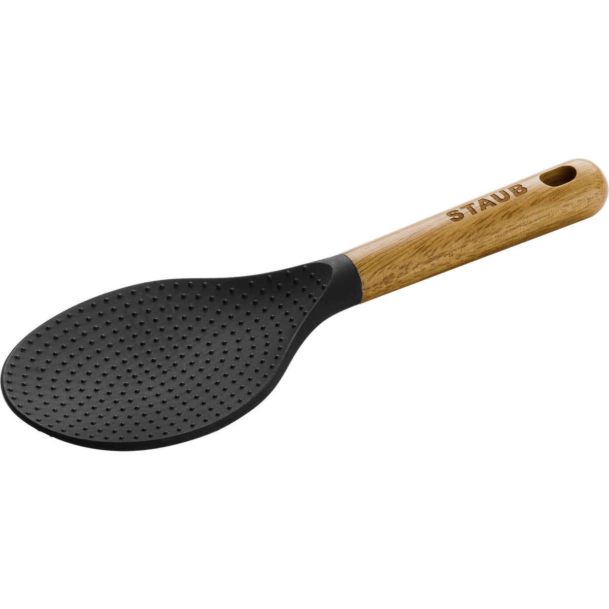 Sort serveringsske fra Staub, 22 cm, ved siden af en gryde
