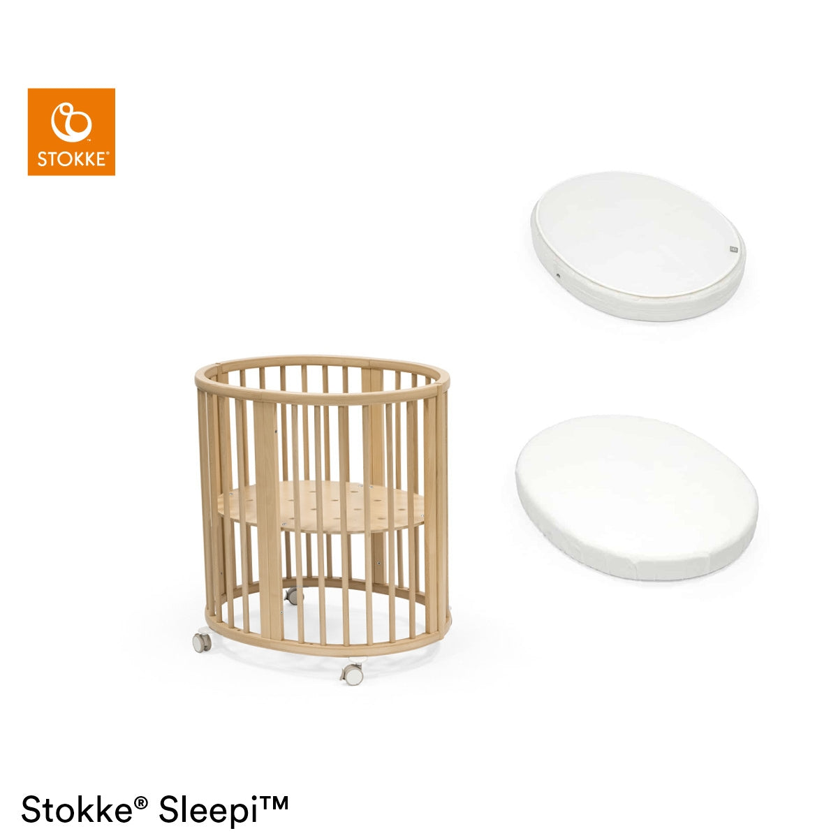 Stokke Sleepi Mini vugge i farven Natur sammen med madras og hvidt lagen