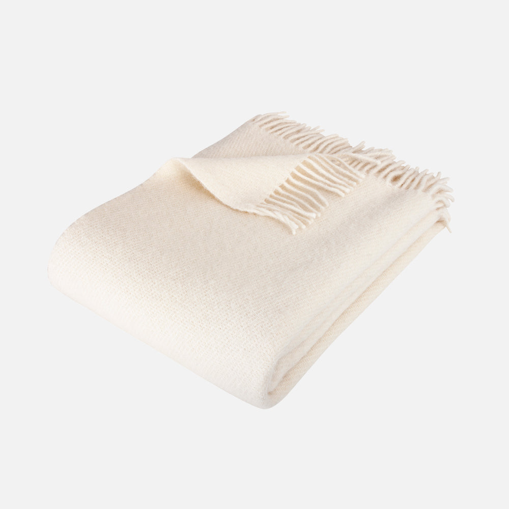Ensfarvet creme uldplaid i serien Solid Nature fra Night & Day