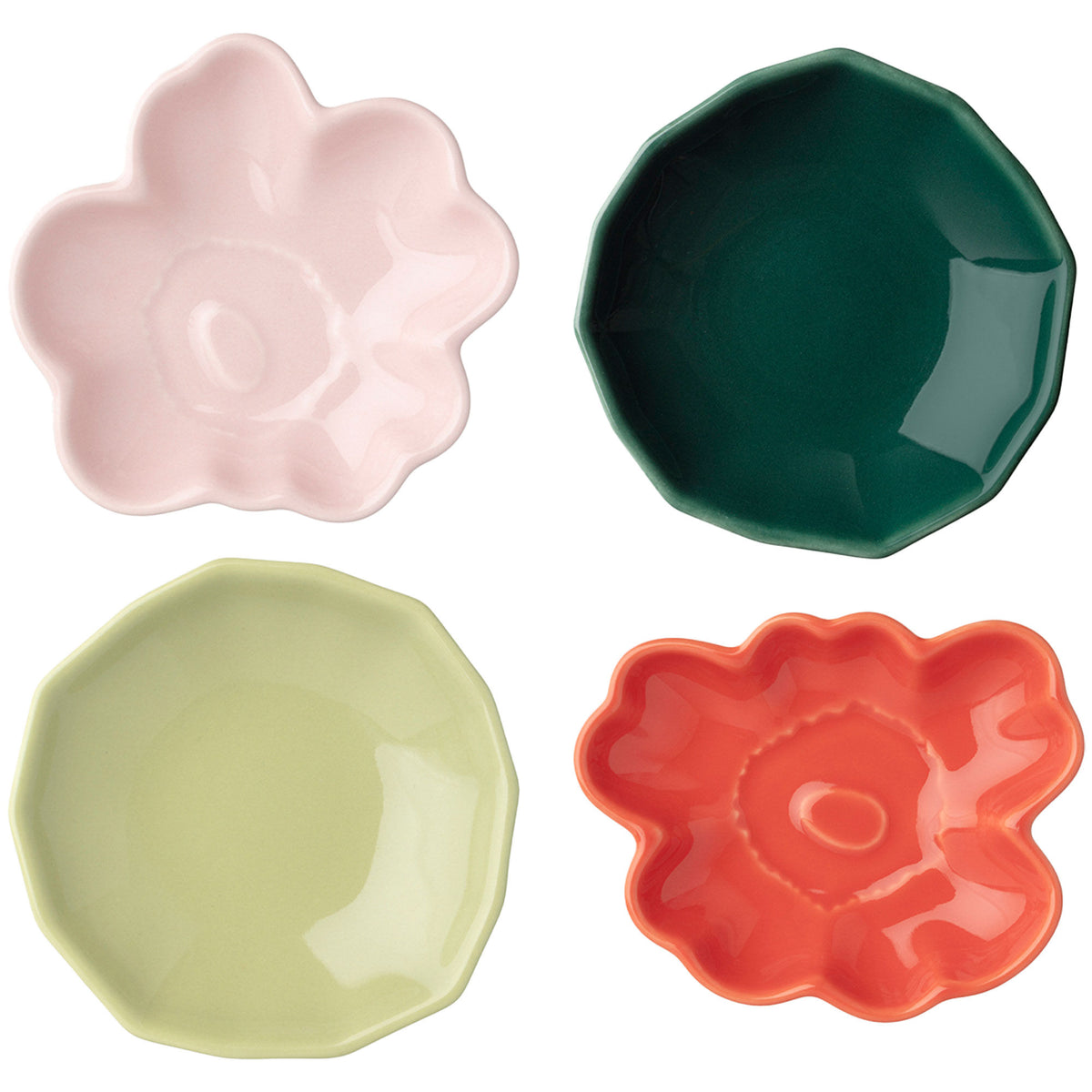 Fire små Marimekko tallerkener med Unikko og Kivet i pink