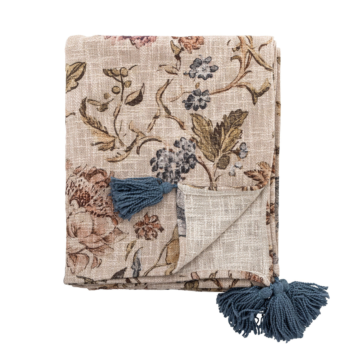 Yoti plaid fra Creative Collection i bomuld med blomstermønster på beige bund