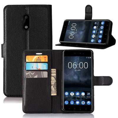 Se Nokia 6 (2017) - læder cover / pung - Sort ❤ Stort online udvalg i Capida ❤ Hurtig levering: 1 - 2 Hverdage samt billig fragt - Varenummer: CPD-V3310470050A og barcode / Ean: på lager - Udsalg på Mobil tilbehør Spar op til 53% - Over 360 kendte mærker på udsalg