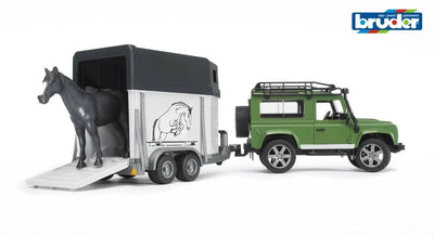 Se Bruder Land Rover Defender Station Wagon med hestetrailer + 1 hest online her - Ean: 4001702025922